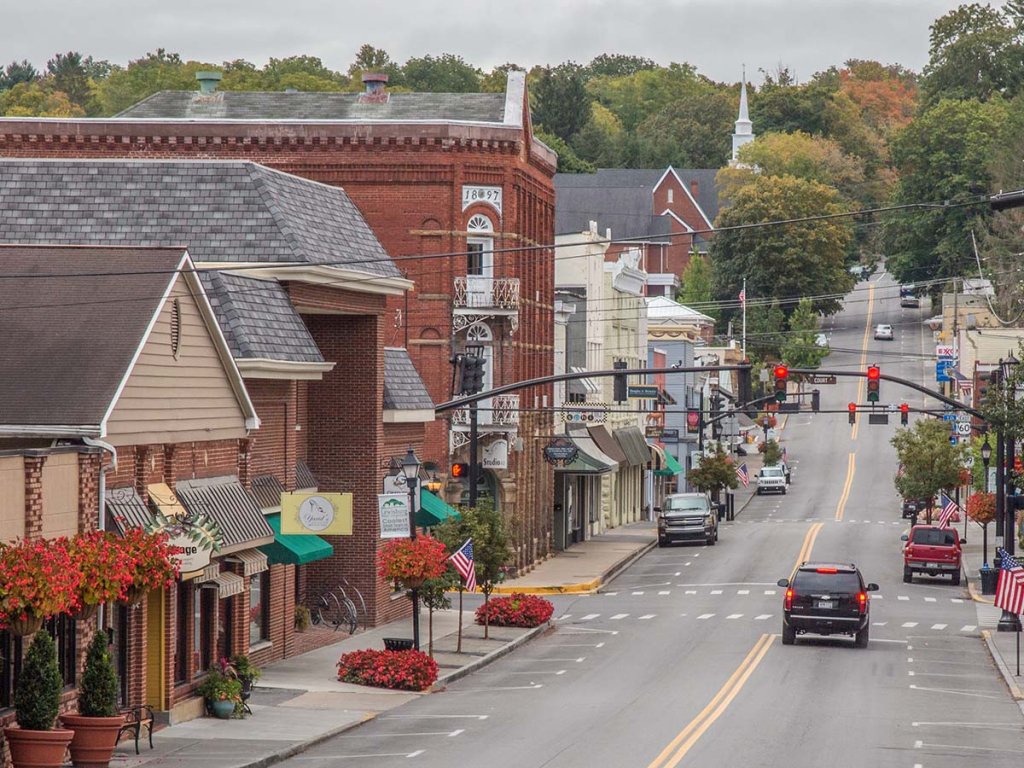 Charming view of historic downtown Lewisburg, WV, with local shops, brick buildings, and small-town charm, perfect for exploring free things to do in the Greenbrier Valley.